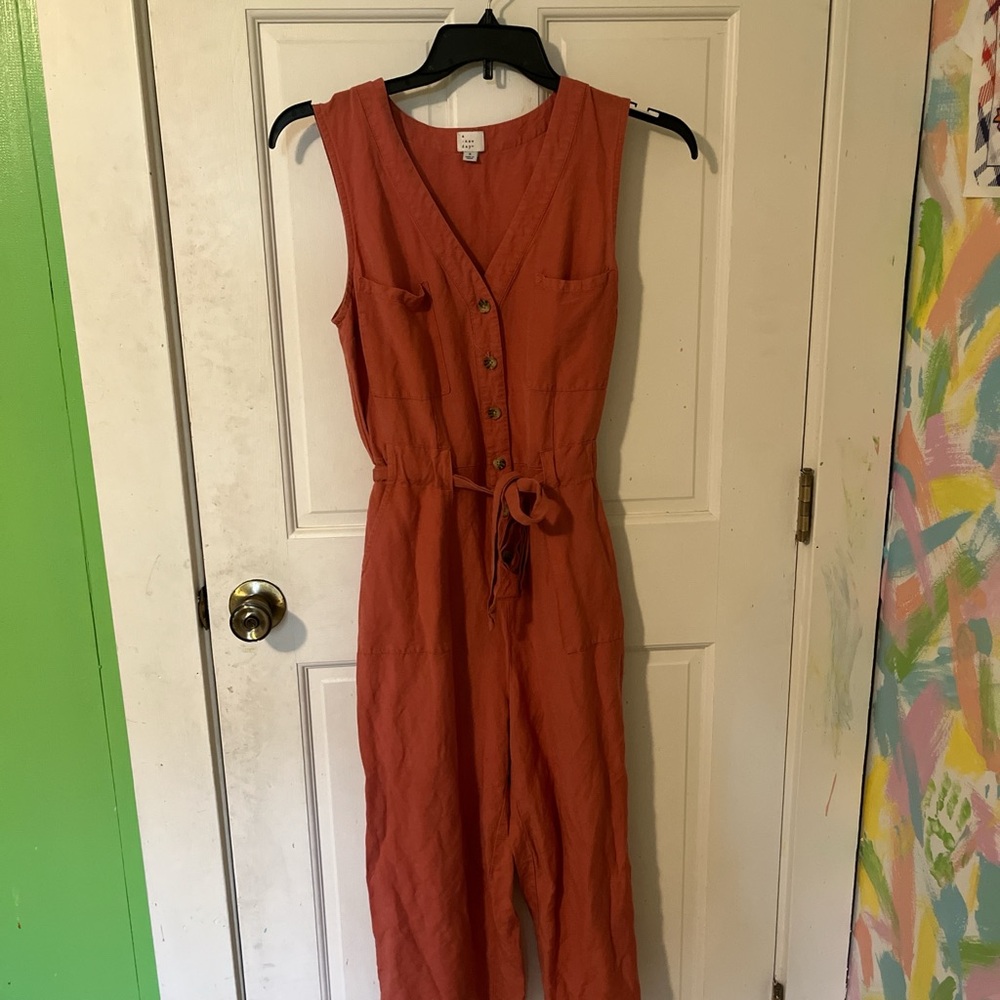 A New Day Orange Sleeveless Jumpsuit with V-Neckline